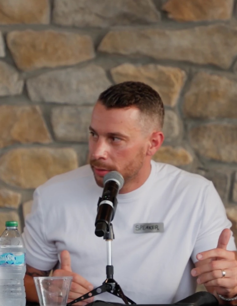 Drew Brucker speaking on a panel
