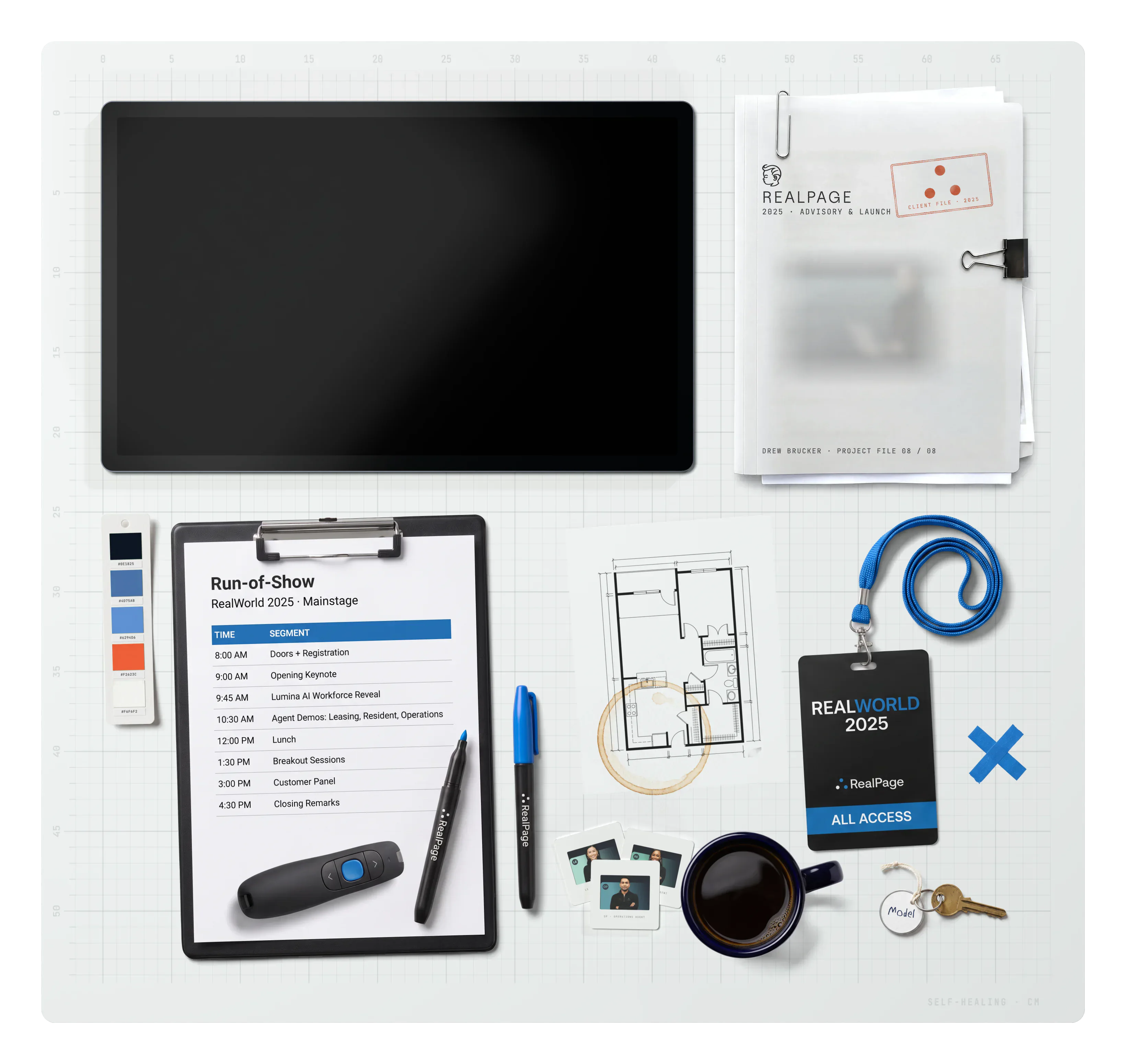 RealPage on the desk: the project file, the brand swatch, a RealWorld run-of-show on a clipboard, a presentation clicker, a floor plan, a coffee ring, slides, a mug of coffee, a RealWorld 2025 ALL ACCESS badge and an apartment key